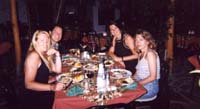 Lucy, Nadia, Kathy, and Chris at dinner